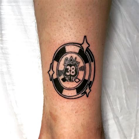 Platinum chip tattoo .